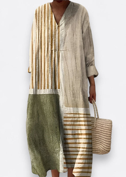 Imelda - Elegantna Geometrijska Haljina" can be rewritten as "Imelda - Stylish Geometric Dress.