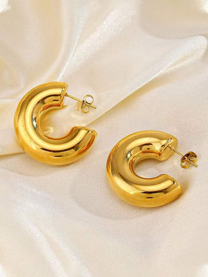 Debele Okrugle Naušnice" can be rewritten as "Chunky Round Earrings.